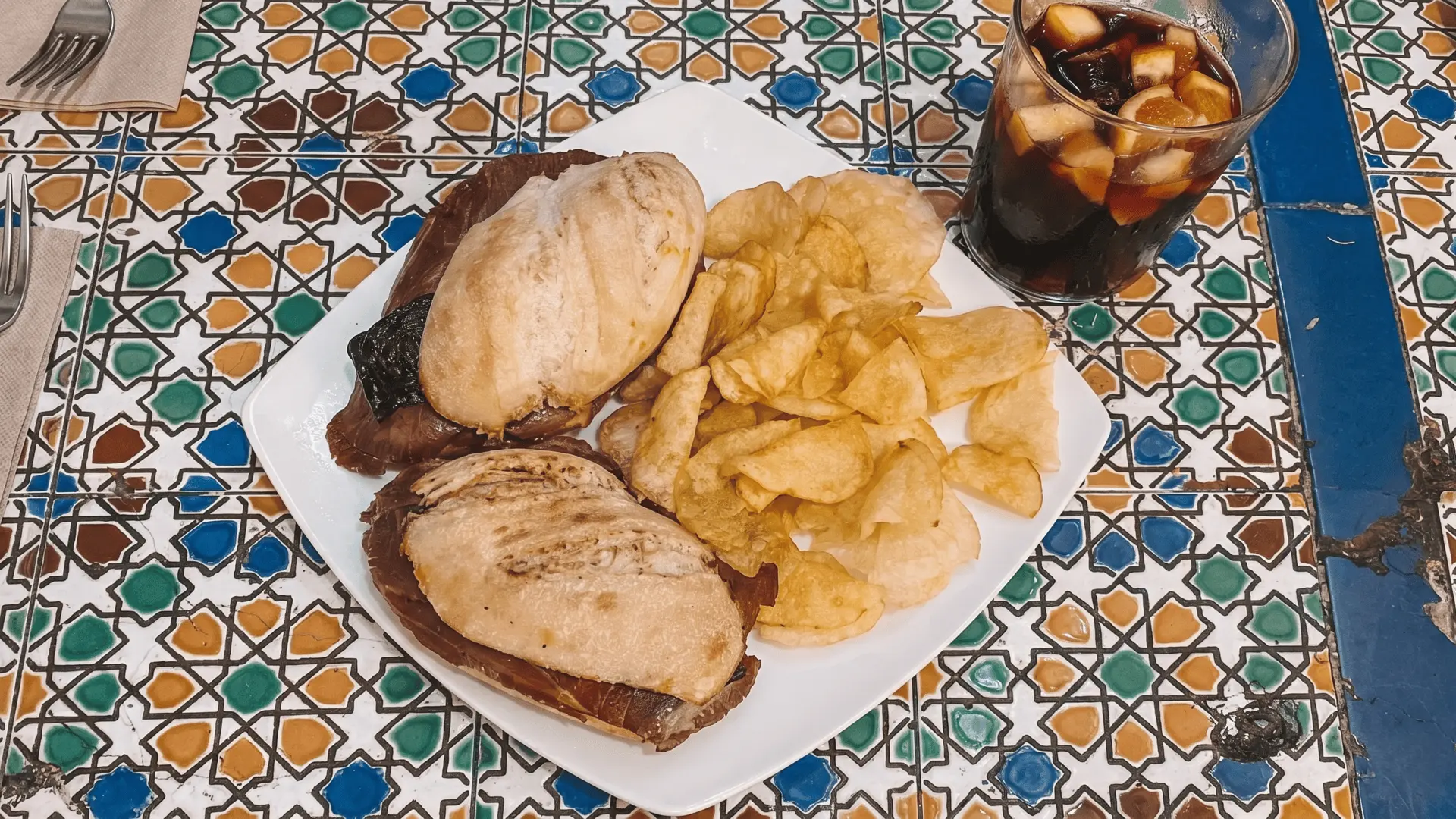 Lamb Sandwich at Lareira Baixa – Seville Foodie Favorite Delicious lamb sandwich from Lareira Baixa, one of the best local eateries in Seville, Spain